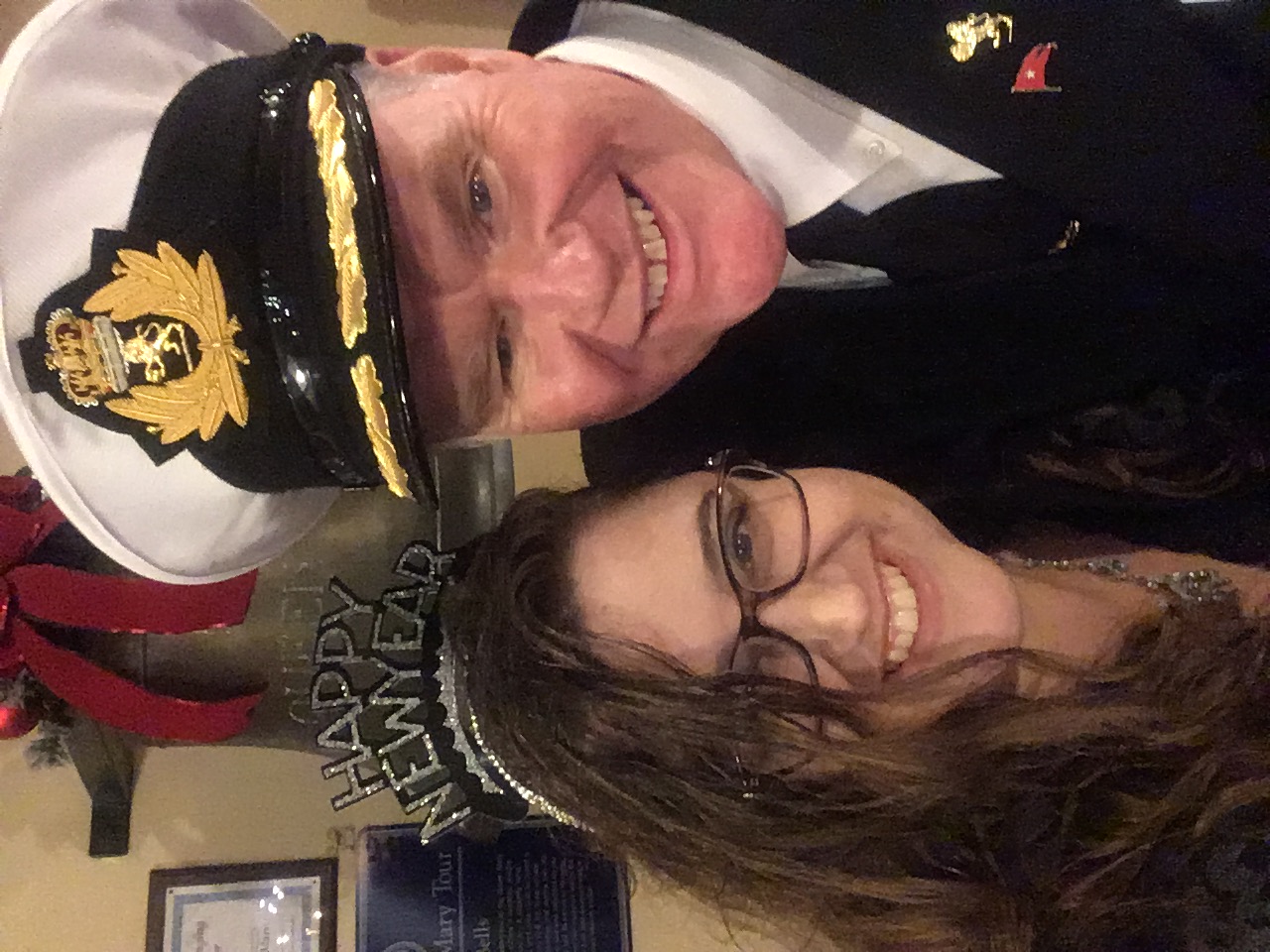 a man and woman wearing hats